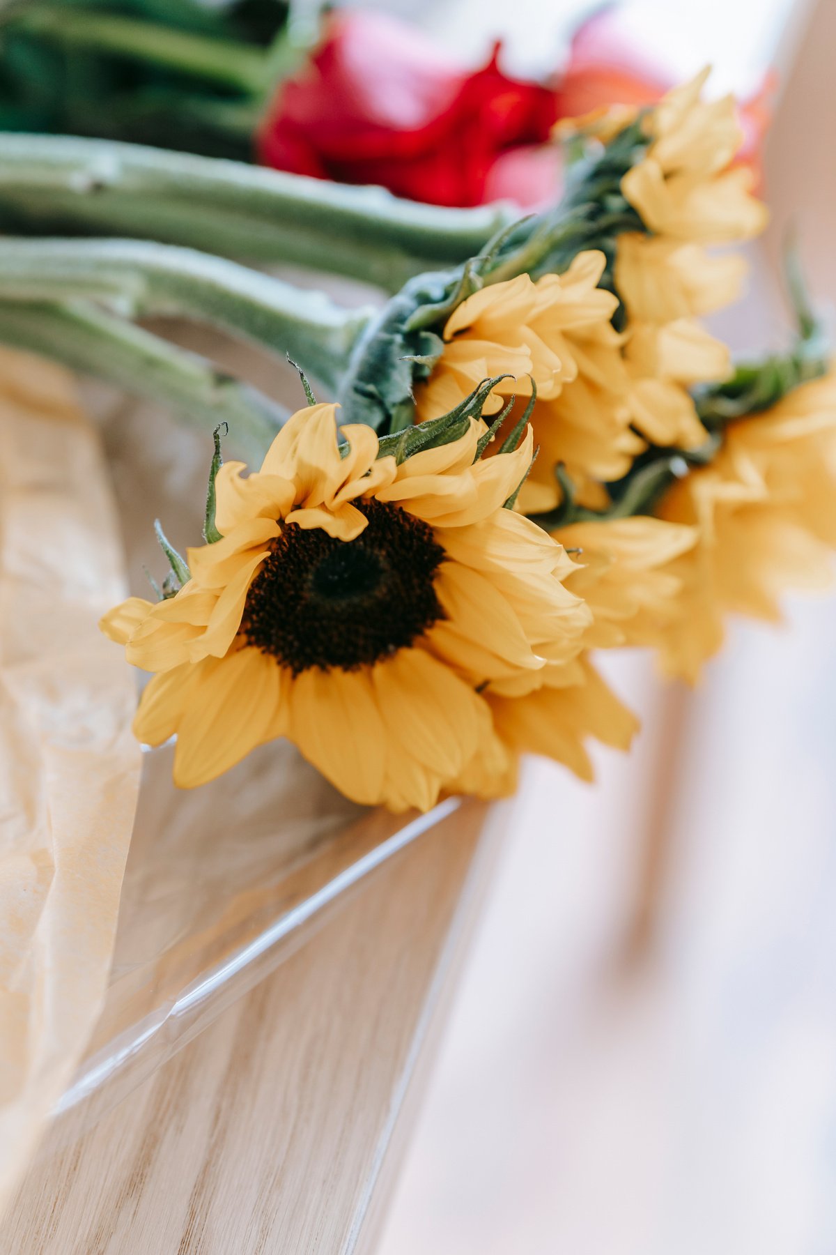 Bouquet of sunflowers on white tablecloth